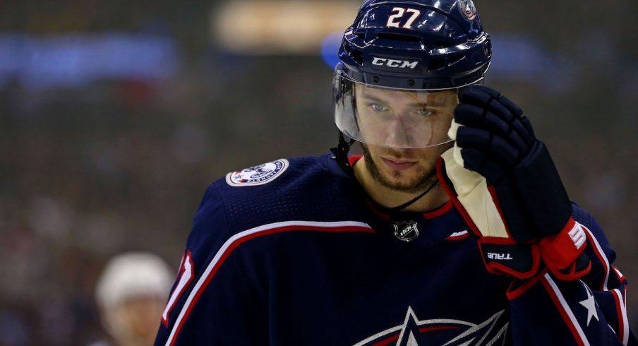 Columbus Blue Jackets defenseman Ryan Murray lines up before face-off during a game at Nationwide Arena.