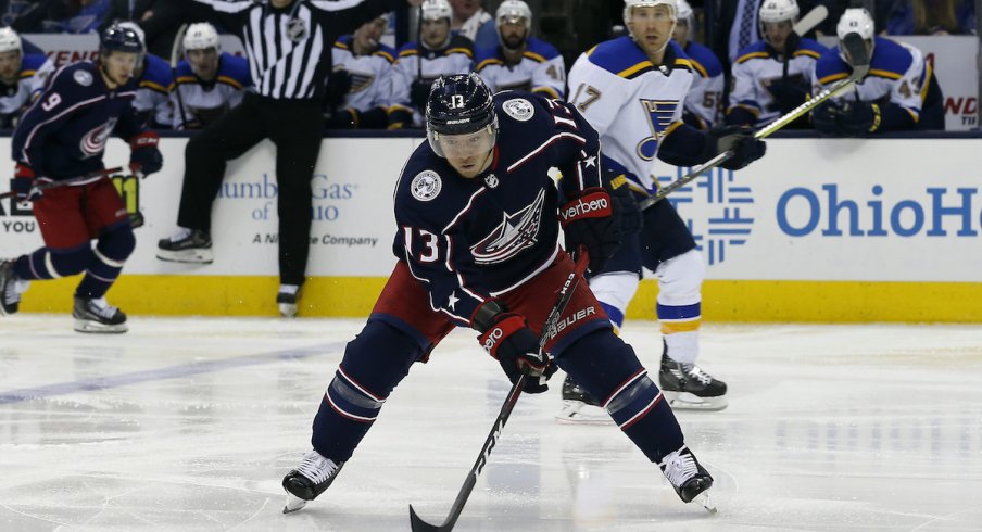 Columbus Blue Jackets forward Cam Atkinson skates with the puck against the St. Louis Blues at Nationwide Arena.