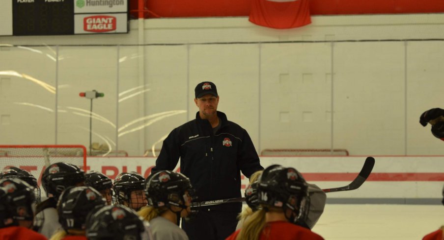 Andrew Cassels skates on the ice with the Ohio State Women's hockey team