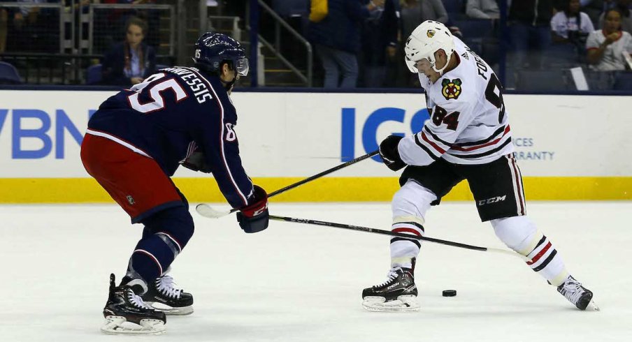 Columbus Blue Jackets defenseman Michael Prapavessis defends during a game against the Chicago Blackhawks at Nationwide Arena.