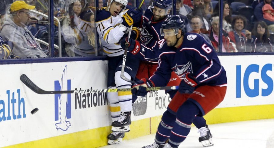 Columbus Blue Jackets defenseman Adam Clendening pursues the puck in a preseason game against the Buffalo Sabres at Nationwide Arena.