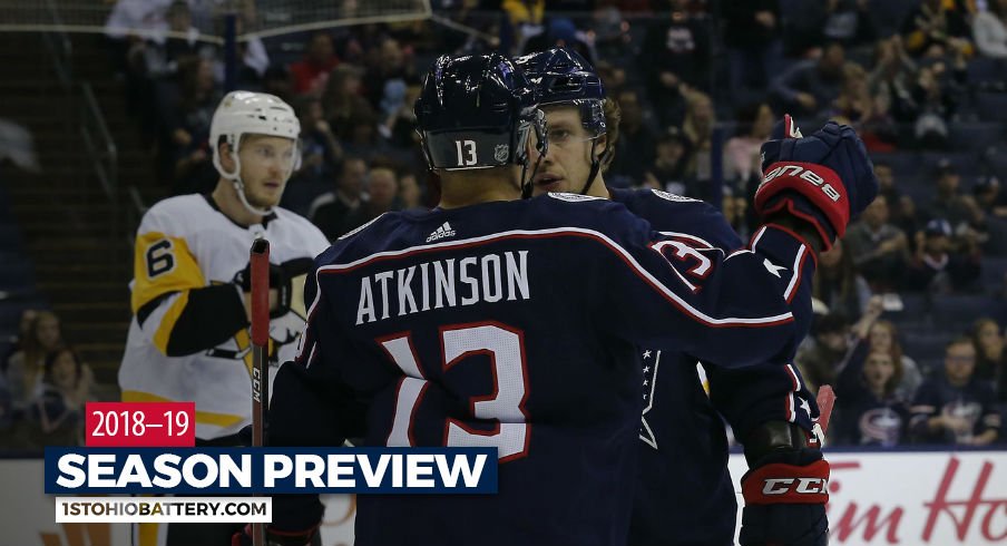 Artemi Panarin and Cam Atkinson score after a goal against the Penguins