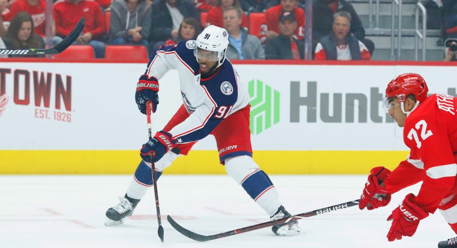 Columbus Blue Jackets forward Anthony Duclair makes a play in the team's season opener against the Detroit Red Wings at Little Caesars Arena.