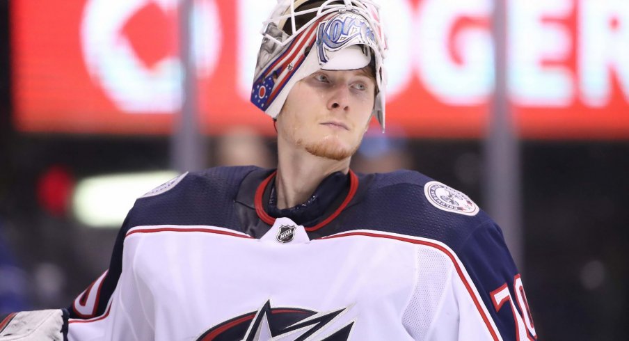 Columbus Blue Jackets goaltender Joonas Korpisalo looks on during a game against the Toronto Maple Leafs.