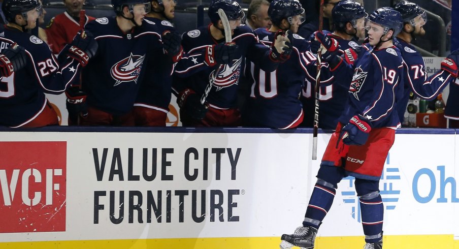 Liam Foudy celebrates scoring a pre-season goal for the Blue Jackets