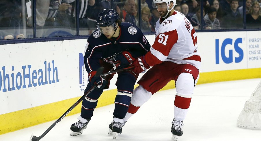 Artemi Panarin carries the puck against the Detroit Red Wings