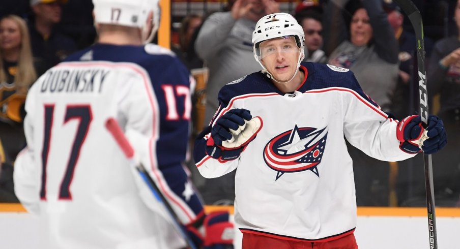 Markus Hannikainen celebrates a goal with Brandon Dubinsky late in the 2017-18 season.