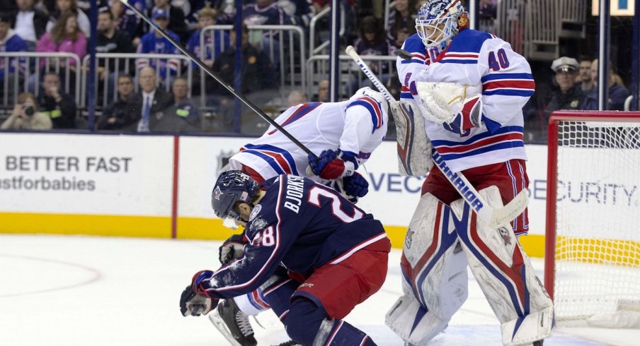 Oliver Bjorkstrand attempts to screen the New York Rangers goaltender.