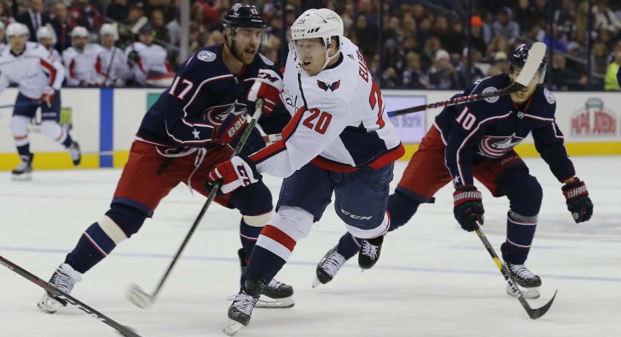 Columbus Blue Jackets center Brandon Dubinsky defends against Lars Eller of the Washington Capitals during a game at Nationwide Arena.