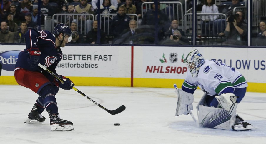 Boone Jenner on a breakaway against Jacob Markstrom 