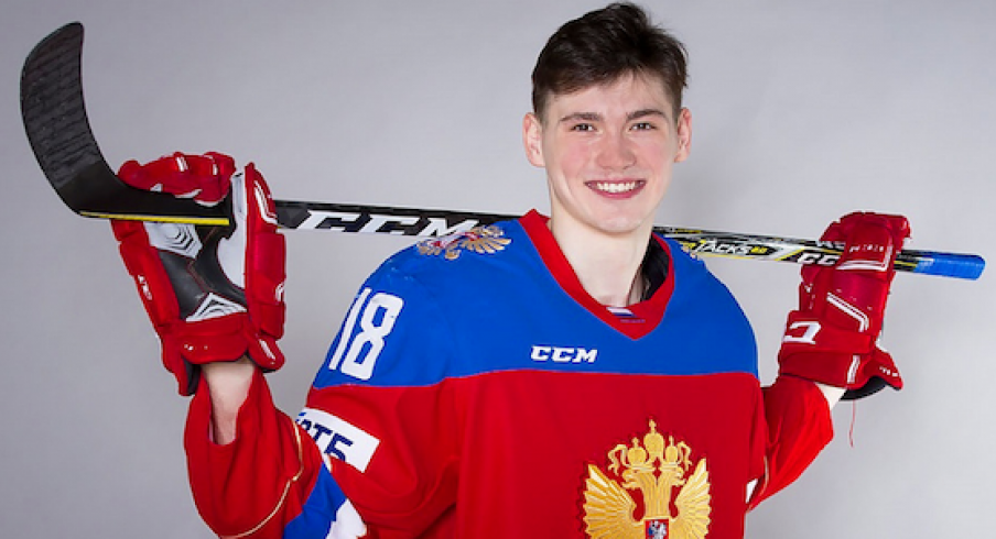Kirill Marchenko poses for a photo showing off his Team Russia duds