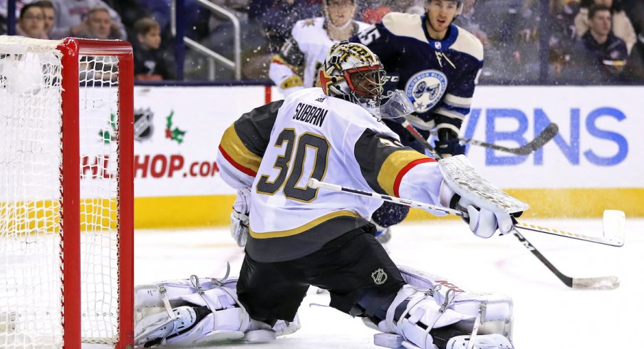 Columbus Blue Jackets center Lukas Sedlak drives the net against Vegas Golden Knights goaltender Malcolm Subban at Nationwide Arena.