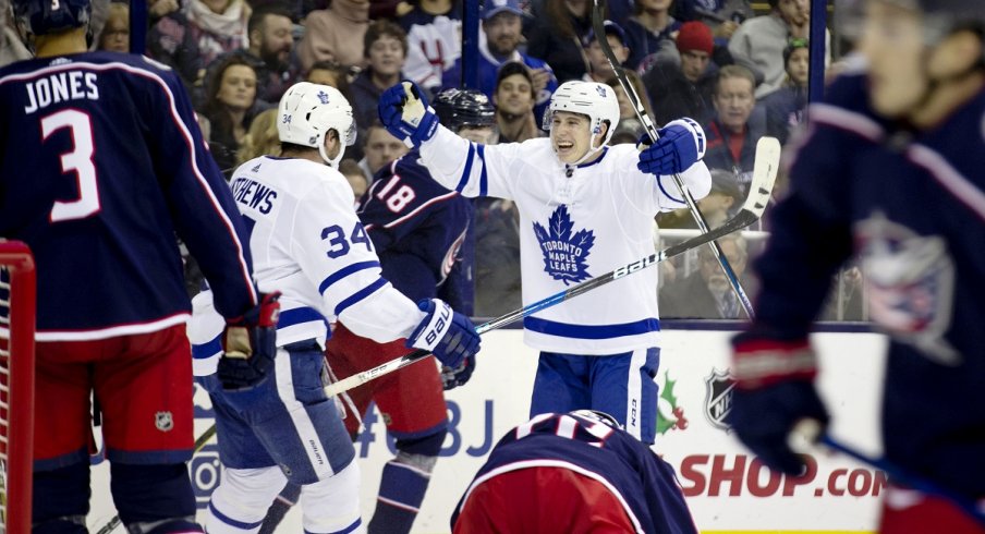 Mitch Marner and Auston Matthews celebrate a goal in a 4-2 win over the Columbus Blue Jackets