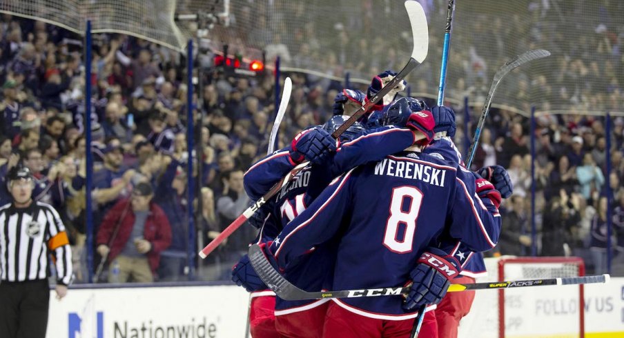 The Blue Jackets celebrate a goal from defenseman Zach Werenski at Nationwide Arena.