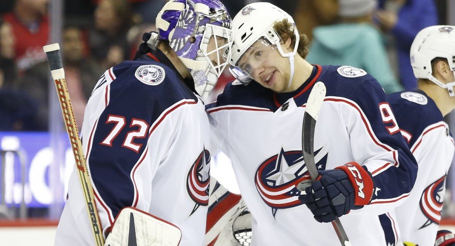 Artemi Panarin and Sergei Bobrovsky celebrate a win over the Washington Capitals at Capital One Arena.