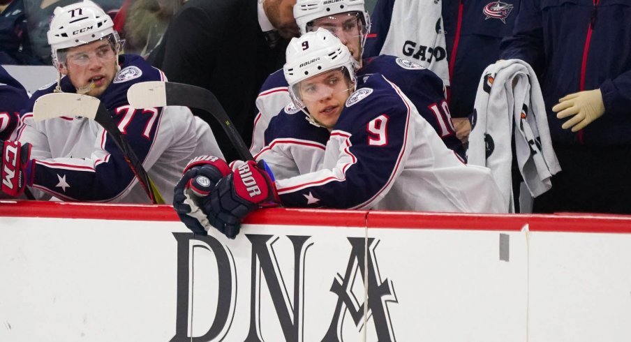 Artemi Panarin looks on from the bench as the Blue Jackets play the Carolina Hurricanes.