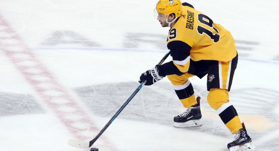 Pittsburgh Penguins center Derick Brassard skates with the puck during a game at PPG Paints Arena.
