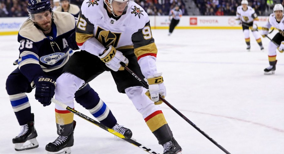 Boone Jenner battles with Golden Knights player Tomas Nosek 