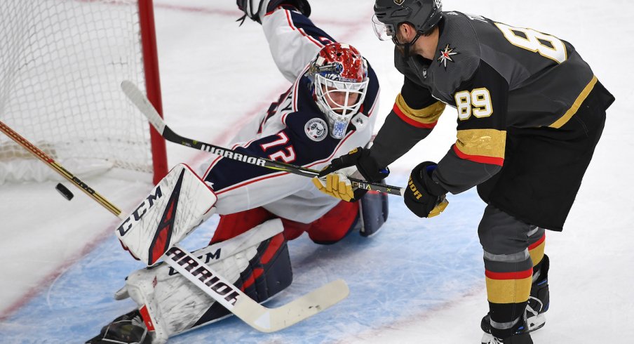 Columbus Blue Jackets goaltender Sergei Bobrovsky makes a breakaway save on Vegas Golden Knights forward Alex Tuch.