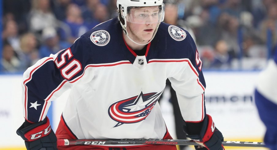 Eric Robinson looks on during the second period of a game at Amalie Arena