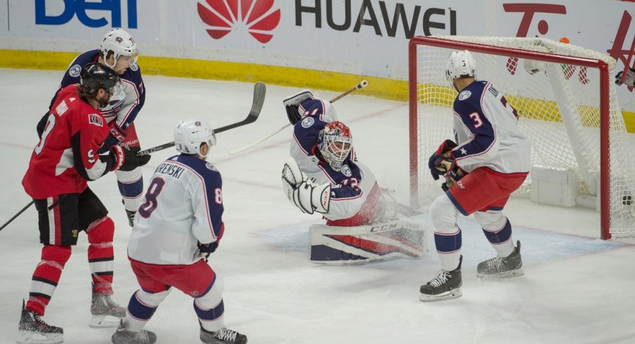 Sergei Bobrovsky tries to save the puck against the Ottawa Senators.