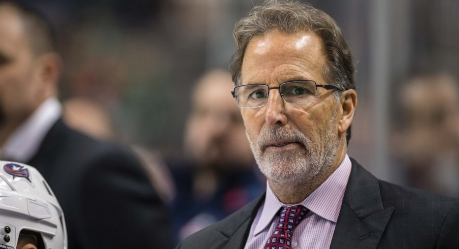 John Tortorella watches the ice as the Blue Jackets attempt to score.