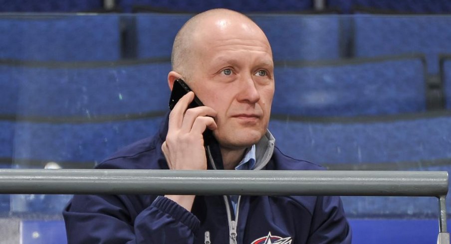 Jarmo Kekalainen working the phones 