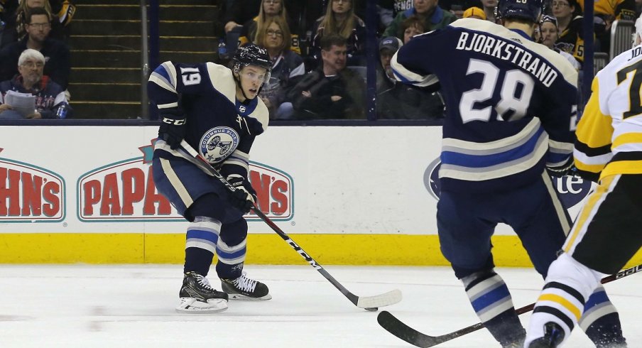  Ryan Dzingel carries the puck against the Pittsburgh Penguins at Nationwide Arena