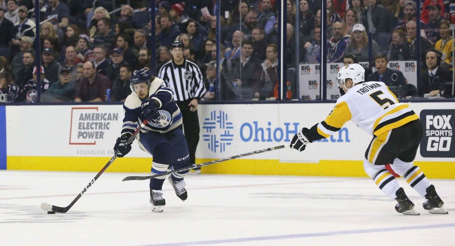  Columbus Blue Jackets left wing Artemi Panarin (9) passes the puck against the Pittsburgh Penguins during the second period at Nationwide Arena.