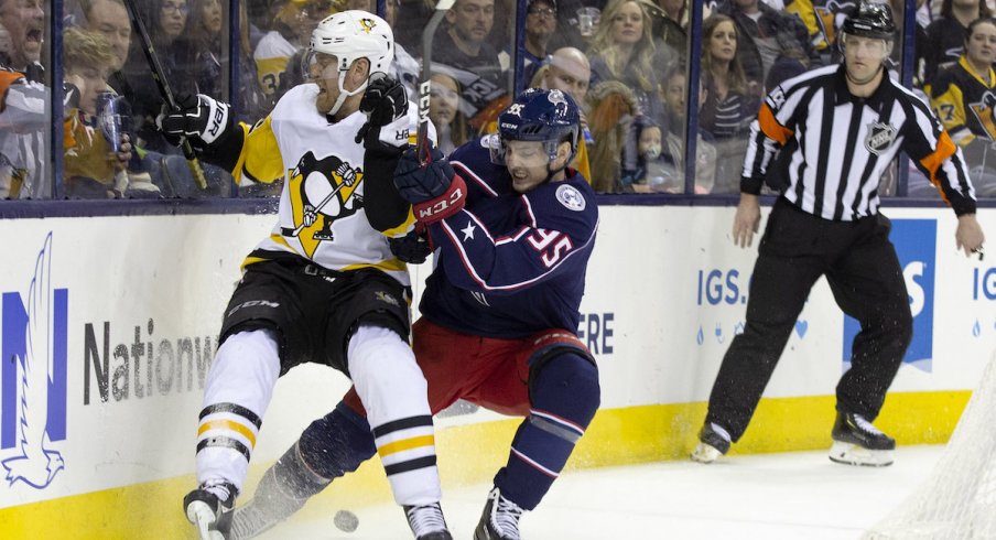 Columbus Blue Jackets center Matt Duchene fights for position against Pittsburgh Penguins defenseman Brian Dumoulin during a game at Nationwide Arena.