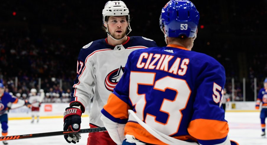 Josh Anderson stares down Casey Cizikas in between play during Blue Jackets-Islanders.