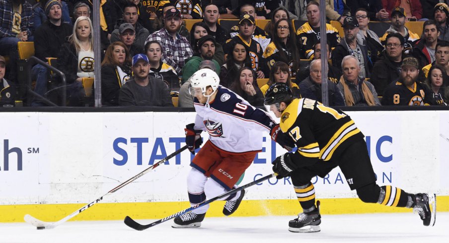 Alex Wennberg carries the puck against the Boston Bruins