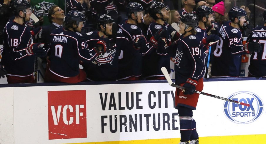 Columbus Blue Jackets left wing Ryan Dzingel (19) celebrates a goal against the Boston Bruins during the first period at Nationwide Arena. 