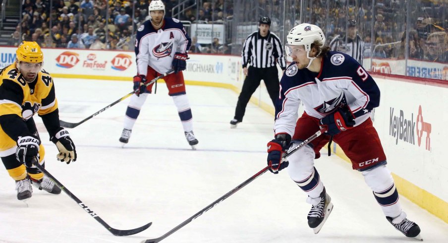 Columbus Blue Jackets left wing Artemi Panarin (9) skates with the puck against Pittsburgh Penguins center Zach Aston-Reese (46) during the third period at PPG PAINTS Arena. The Penguins shut out the Blue Jackets 3-0.