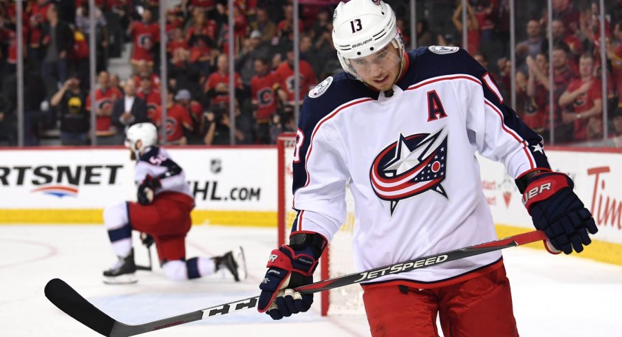 Columbus Blue Jackets right wing Cam Atkinson (13) reacts to a Calgary Flames empty net goal in the third period at Scotiabank Saddledome. Flames won 4-2. 