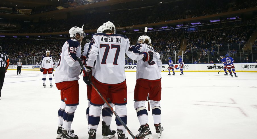 Josh Anderson, Matt Duchene and Artemi Panarin celebrate a goal for the Columbus Blue Jackets in a game against the New York Rangers at Madison Square Garden.