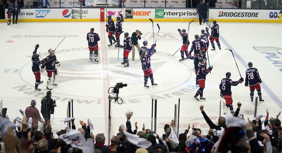 The Columbus Blue Jackets celebrate their first round win over the Tampa Bay Lightning at Nationwide Arena