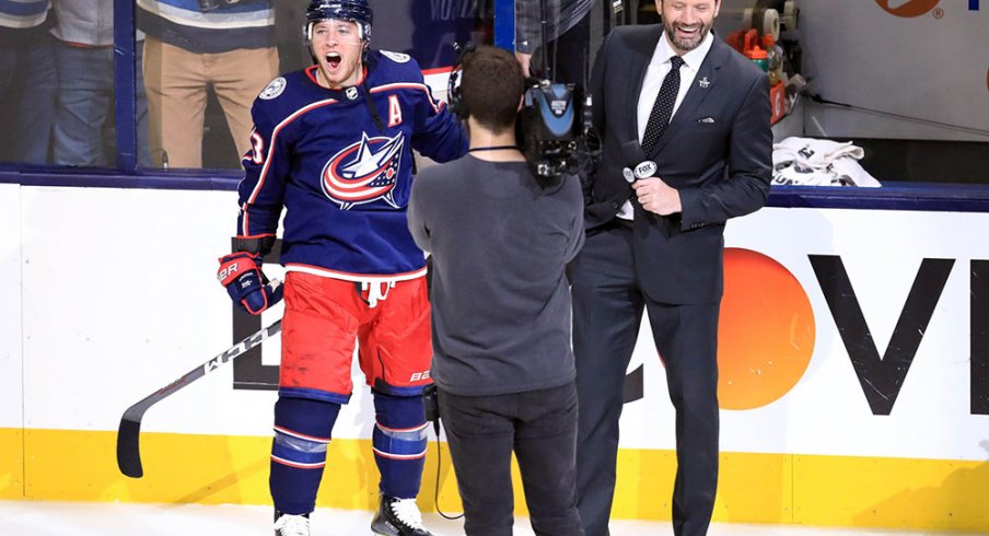 Cam Atkinson celebrates the Blue Jackets first ever playoff series win. 