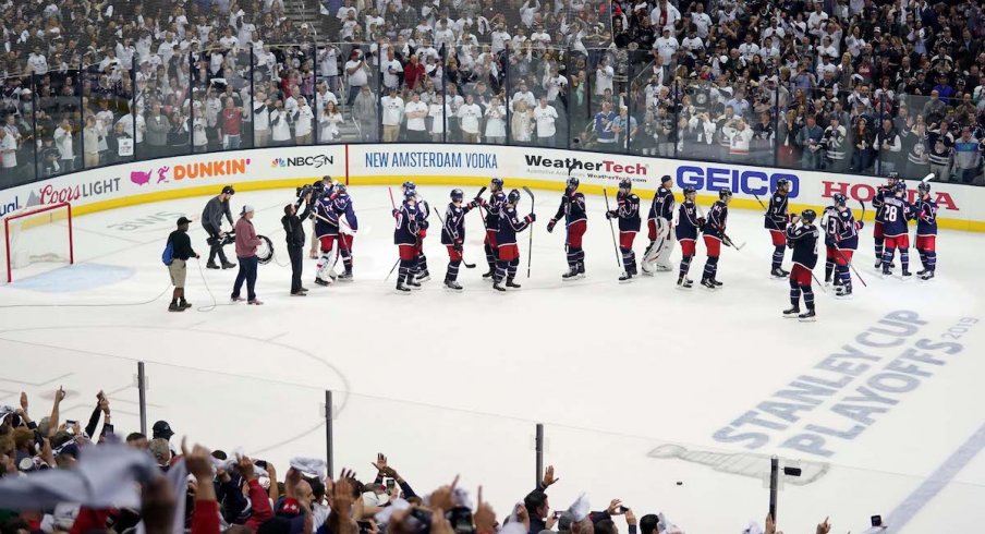 The Columbus Blue Jackets salute their crowd at Nationwide Arena after a Game 4 win over the Tampa Bay Lightning.