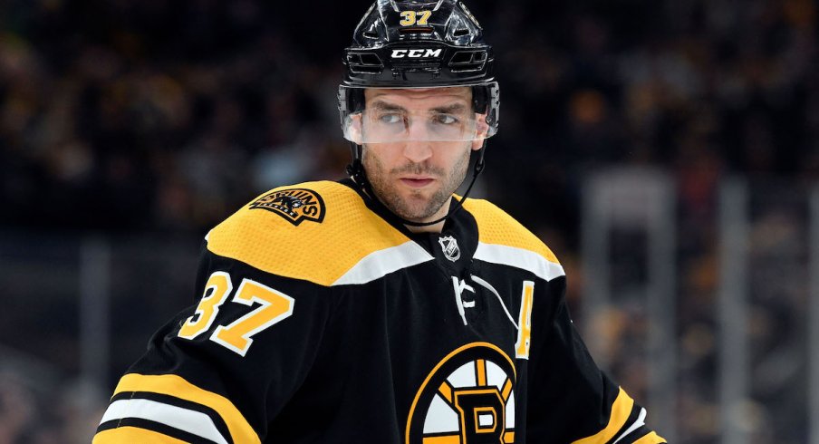 Boston Bruins center Patrice Bergeron looks on during a game against the Columbus Blue Jackets at TD Garden.