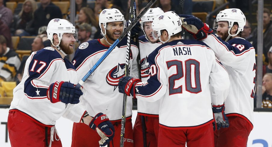 The Columbus Blue Jackets celebrate a third period goal scored by Brandon Dubinsky in Game 1 against the Boston Bruins at TD Garden.