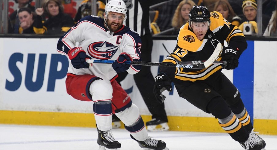  Nick Foligno and Charlie Coyle battle for the puck in Game 2 between the Columbus Blue Jackets and Boston Bruins.