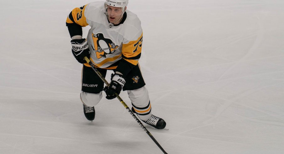 Pittsburgh Penguins defenseman Jack Johnson moves the puck against the Tampa Bay Lightning at Amalie Arena.