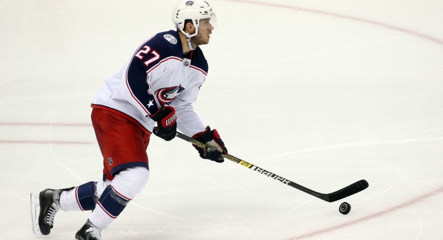 Ryan Murray skates the puck up ice