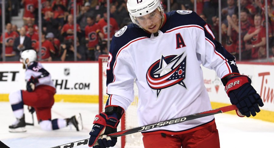 Blue Jackets forward Cam Atkinson reacts after Calgary scores an empty-net goal at the Scotiabank Saddledome