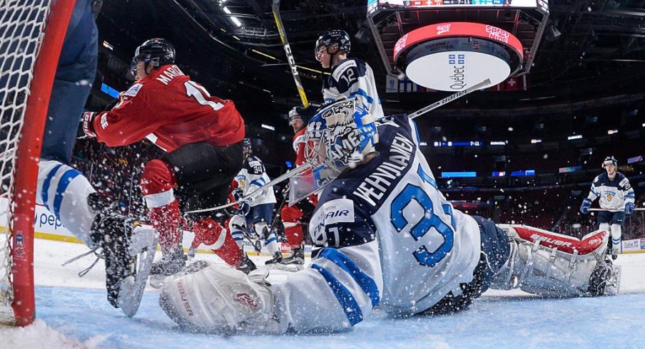 Columbus Blue Jackets prospect Veini Vehvilainen scrambles for position during a game for Team Finland.