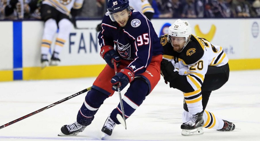 Matt Duchene skates around Joakim Nordstrom of the Boston Bruins