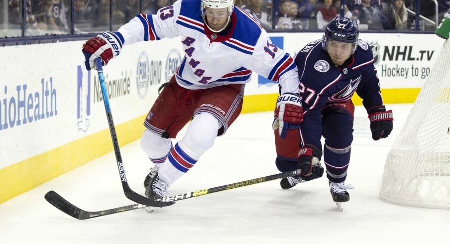 Kevin Hayes and Ryan Murray battle for the puck at Nationwide Arena