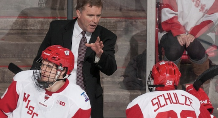 Mike Eaves, new head coach of the Cleveland Monsters, guides the University of Wisconsin men's hockey team.