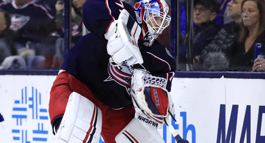 Columbus Blue Jackets Joonas Korpisalo prepares to pass the puck at Nationwide Arena against the Tampa Bay Lightning during the regular season in February of 2018.